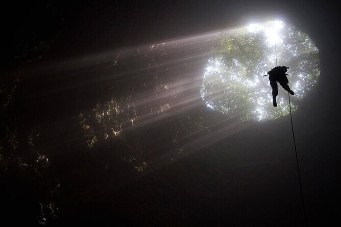 1 day Yogyakarta Tour Jomblang cave and Pindul Cave tubing - Jomblang Cave rappel: the 30-meter sinkhole moment